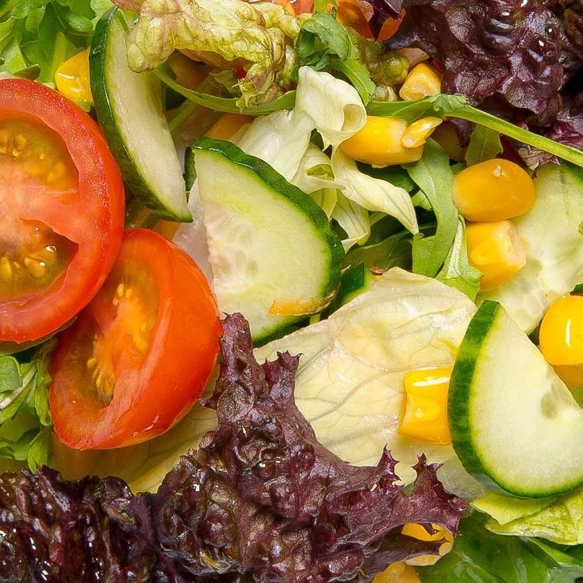 Fresh vegetable salad with corn and fresh lemon sauce