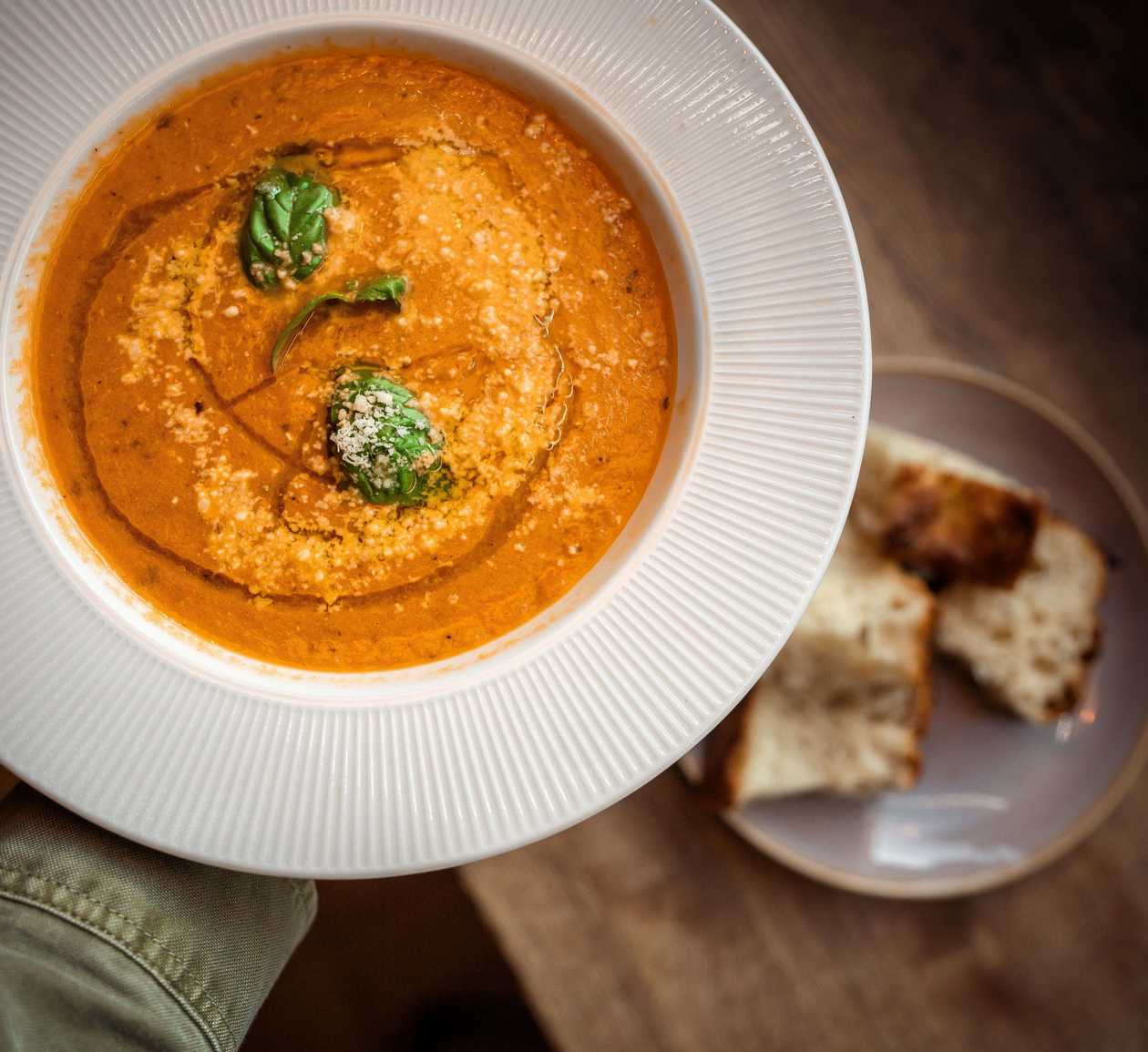 Creamy cherry tomato soup with freshly baked focaccia