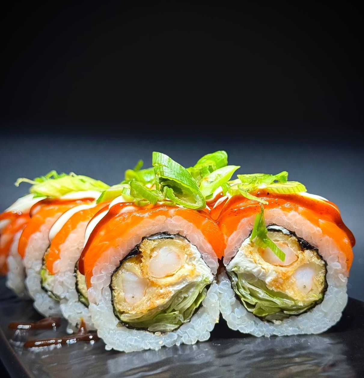 Roll with shrimp tempura and salmon