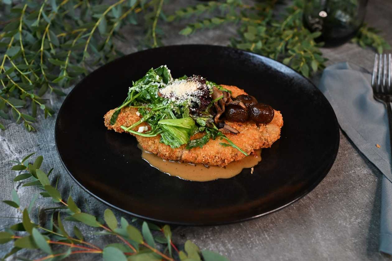 Veal schnitzel with Parmesan cheese crust