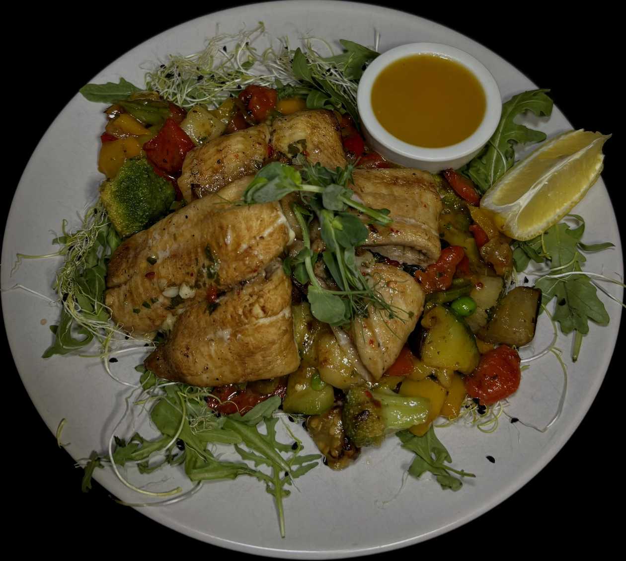 Baltic flounder fillet with Sicilian-style vegetables and mango sauce
