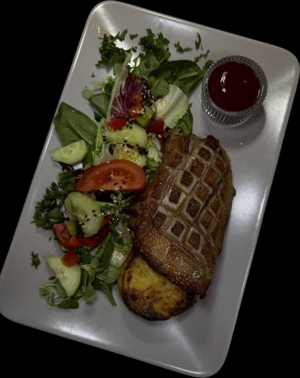 Oven-baked duck breast with potato-cheese gratin and whiskey-apple sauce