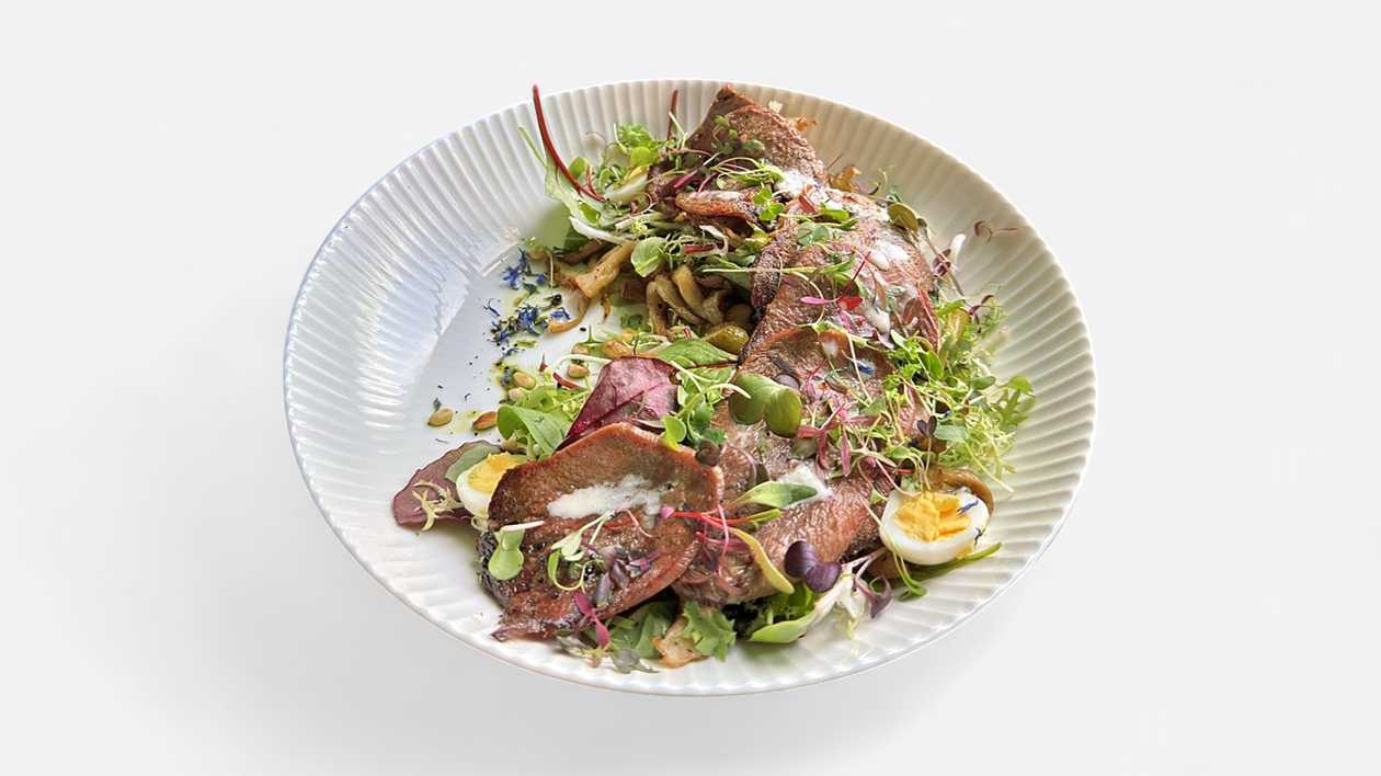 7072. Warm beef tongue salad