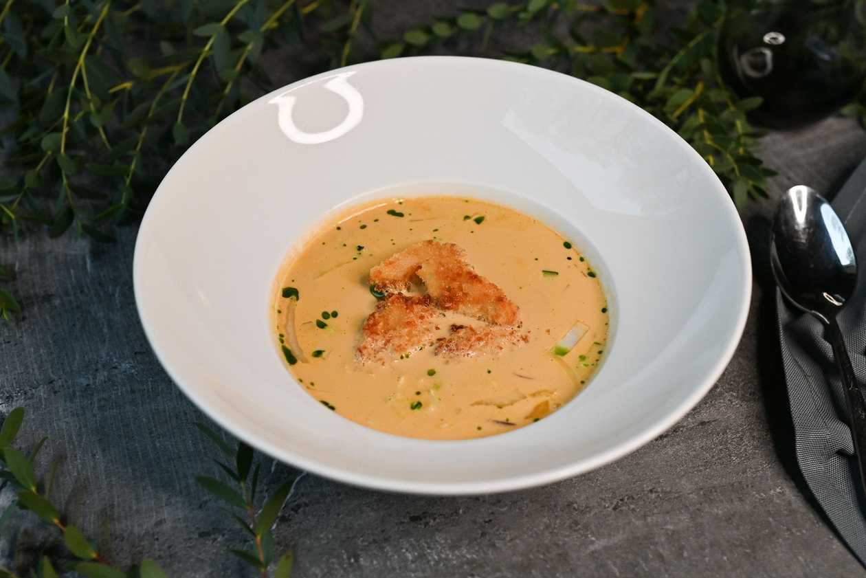 Spicy chicken soup with coconut milk