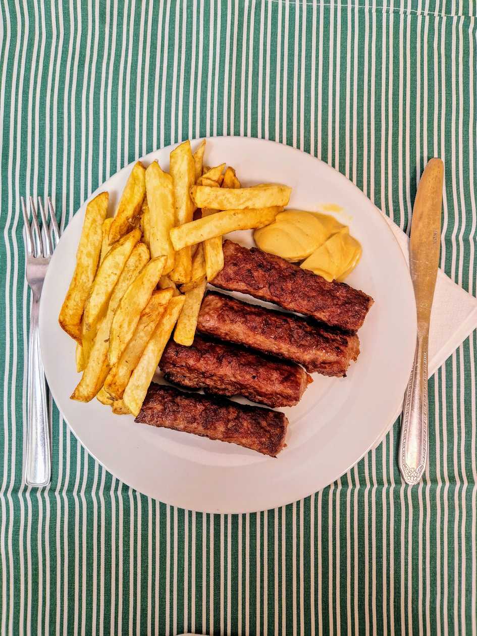 Mici with Mustard and French Fries