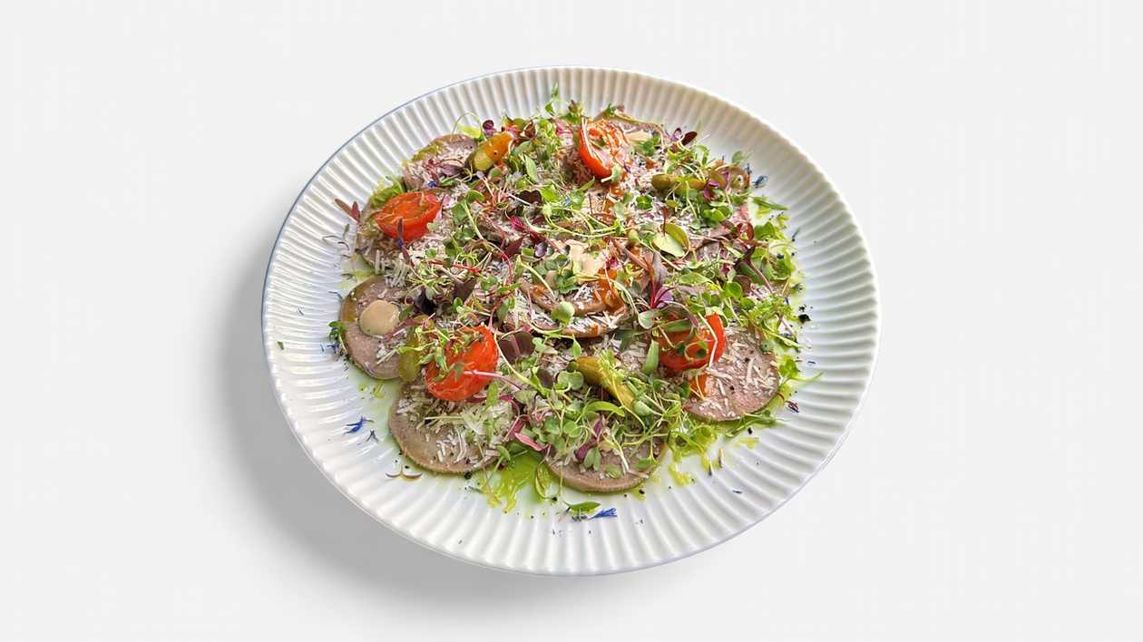7070. Beef tongue carpaccio with Vitello Tonnato sauce and kimchi tomatoes
