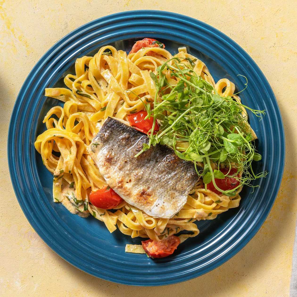PAN-FRIED SEA BASS FILLET  WITH FRESH PASTA, WINE AND BUTTER SAUCE, SAFFRON AND CITRUSES