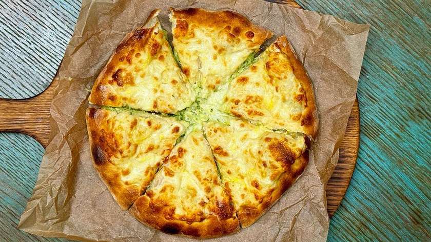 Khachapuri with spinach and cheese
