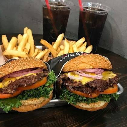 2 burgers , Fries, onion rings and 2 Refreshers