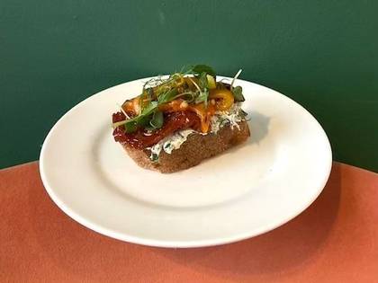 Tapas with cream cheese, pickled pepper and sun-dried tomato