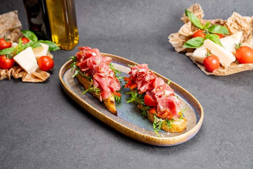 Bruschetta with Marinated Cherry Tomatoes and Euphoria Beef Pastrami