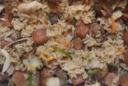 GIZZARD AND SAUSAGE FRIED RICE AND PLANTAIN