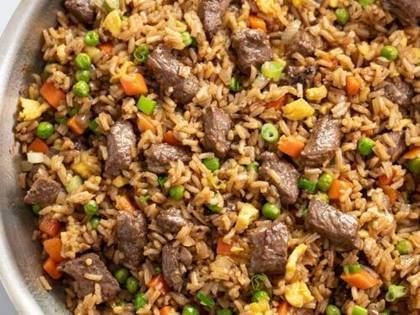 BEEF AND GIZZARD FRIED RICE AND PLANTAIN