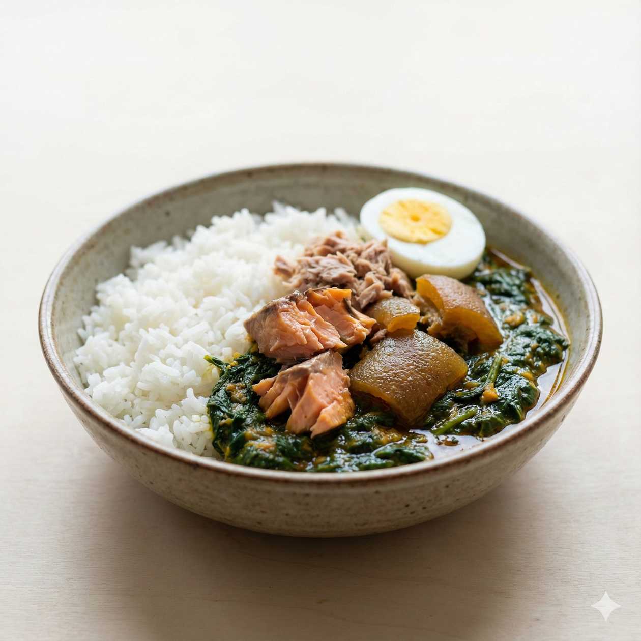 Plain rice and Kontomire stew