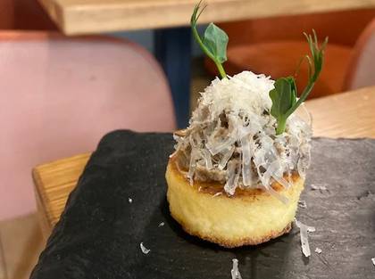 Fried polenta with parmesan, mushrooms and crispy onions