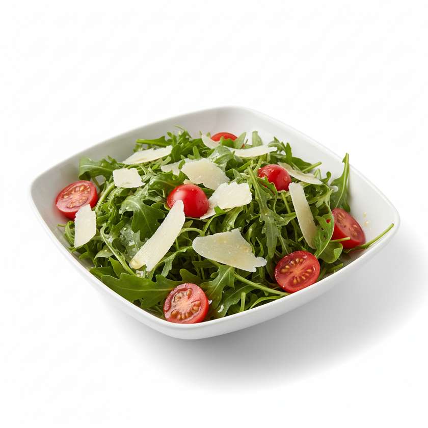 Arugula salad with cherry tomatoes, parmesan shavings and vinaigrette dressing