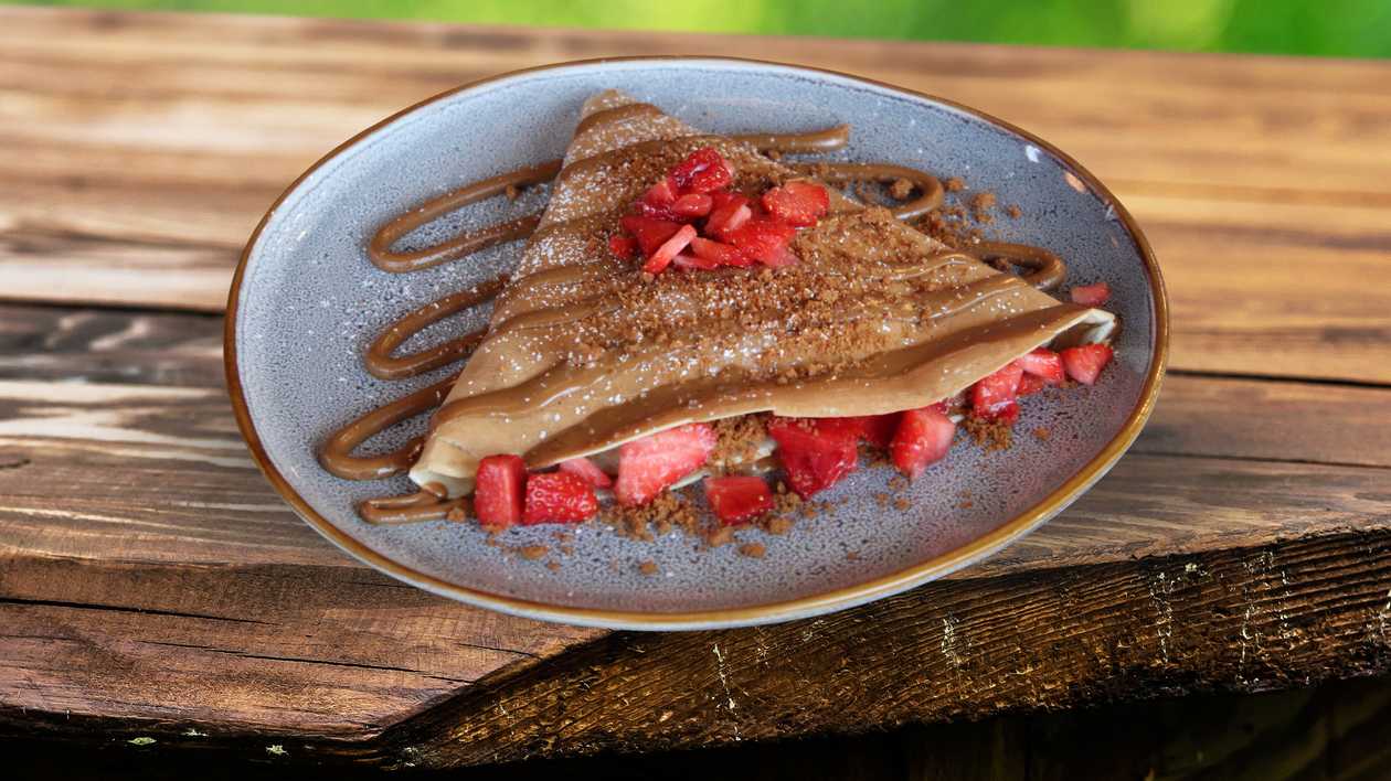 Biscoff sauce, crushed Biscoff and Strawberries Crepe