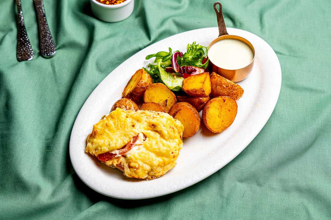 Pork with Cheese and Tomato Topping