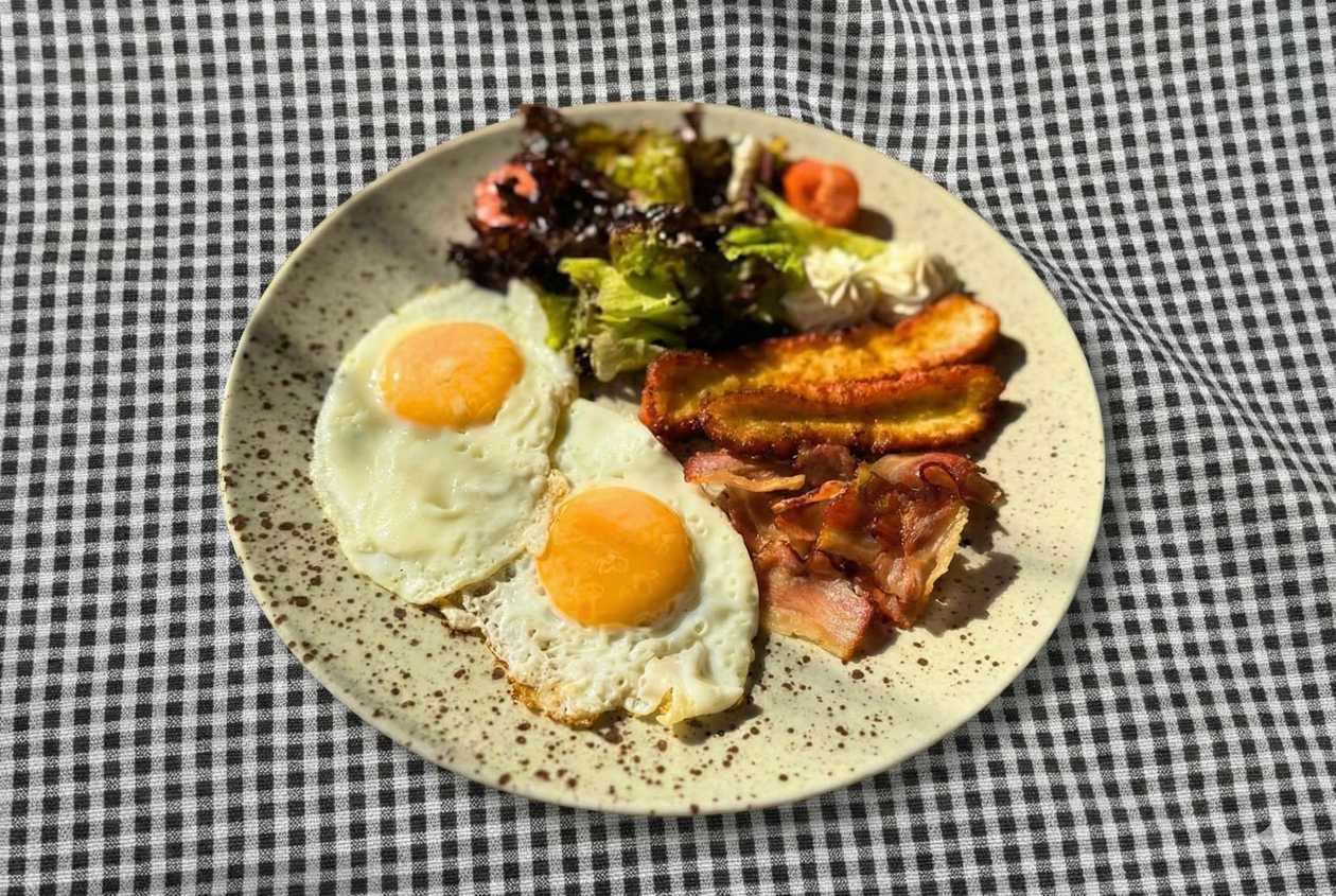 Fried eggs with bacon and grilled cheese