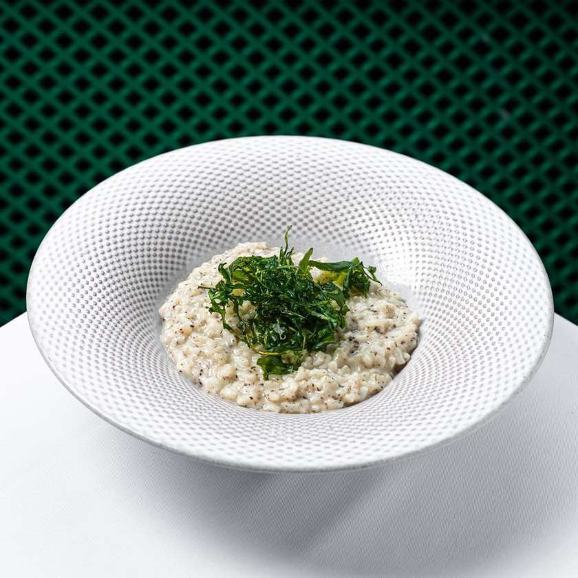 Risotto  con crema di tartufo nero