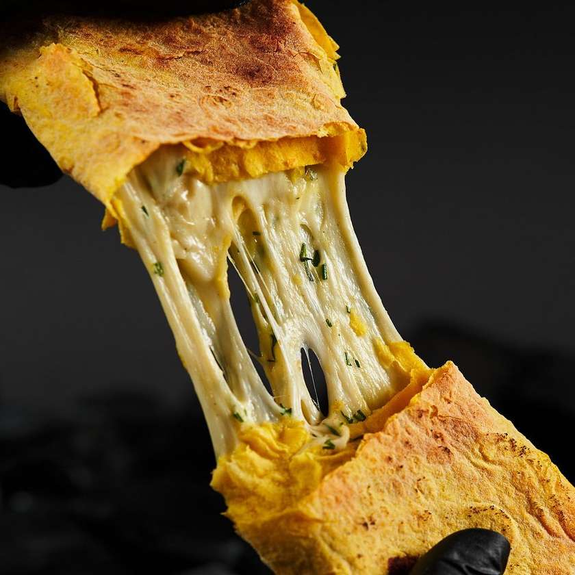 Pita bread with suluguni and tomato