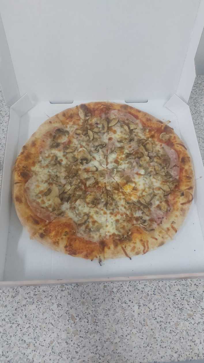 Pizza prosciutto e funghi