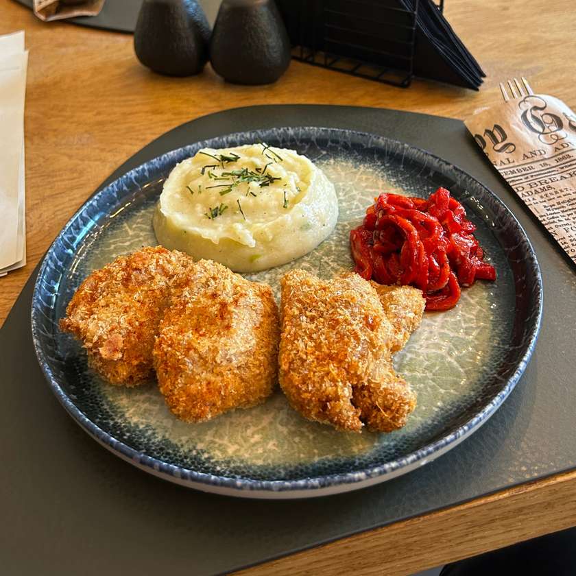 Soy Schnitzel with mashed Potatoes - 65 RON served with roasted pepper salad