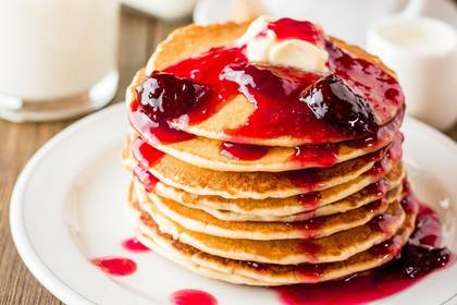 Pancakes with sweet cheese and fruit sauce