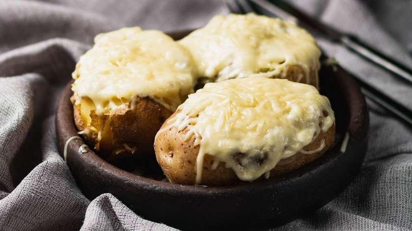 Baked potatoes with mushrooms and cheese