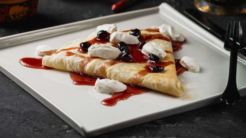 Pancake with sour cream and jam
