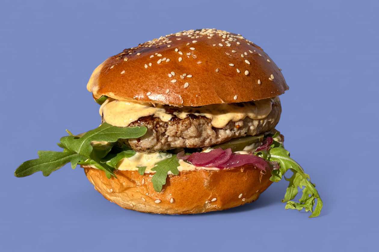 Pork burger stuffed with cheddar