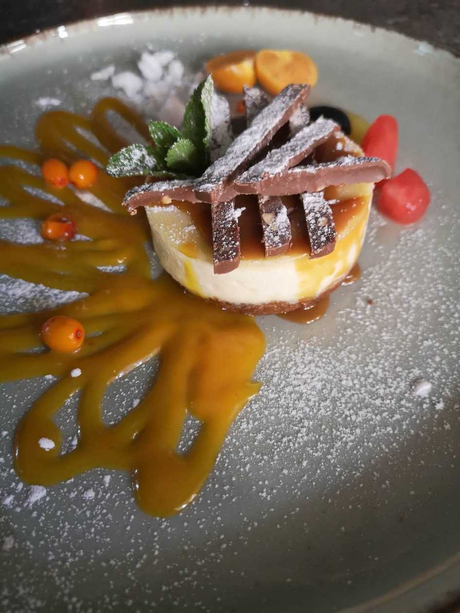 Cheesecake with sea buckthorn cream