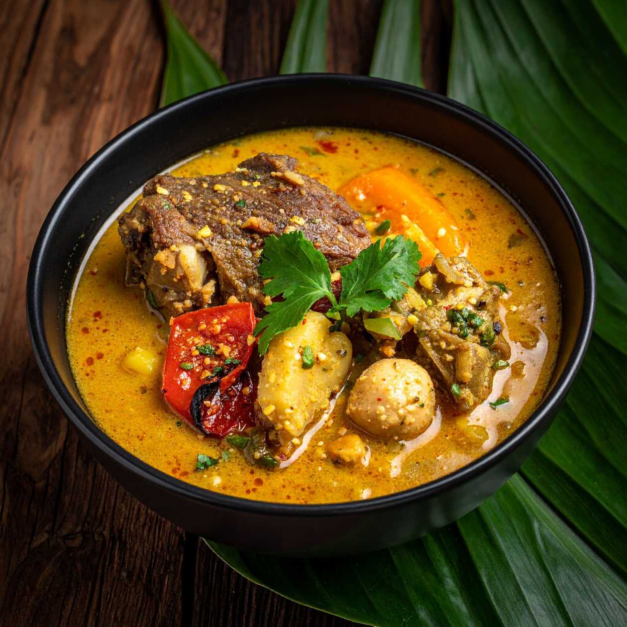 Omotuo special with Palm Nut or Ground Nut Soup With Tilapia or Goat Meat