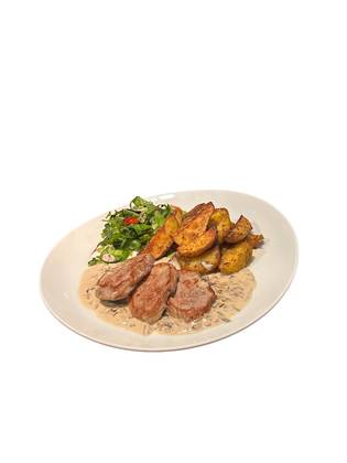 Pork medallions (200g) with mushroom sauce and baked potatoes