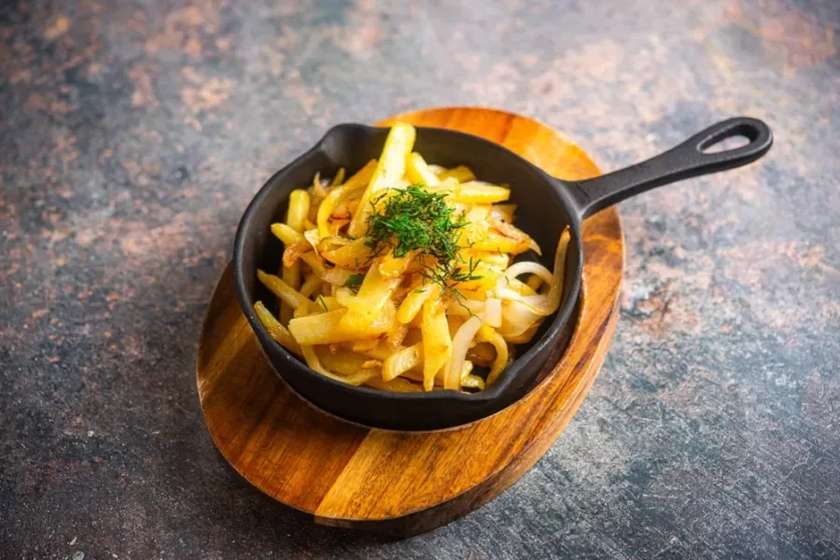 Homemade fried potatoes with onions