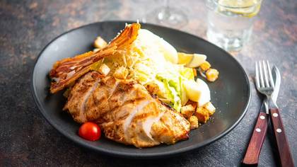 Caesar salad with grilled chicken fillet