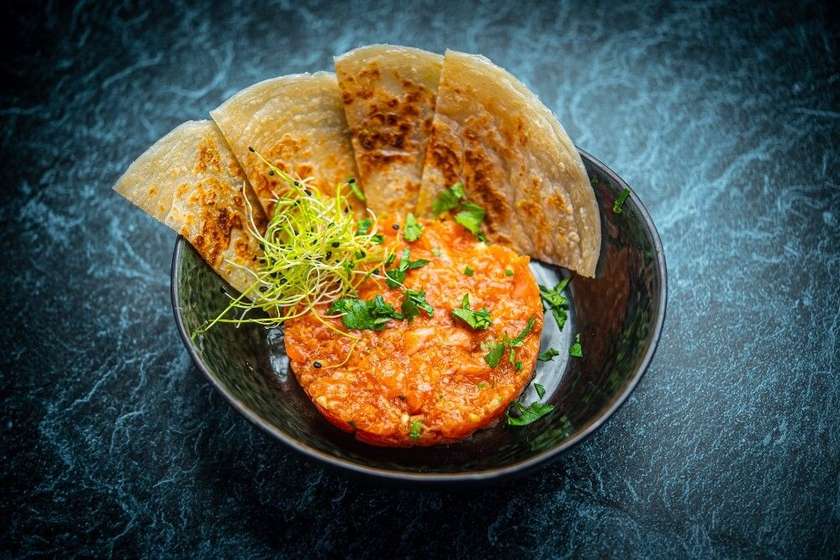 26. Salmon tartare with Roti pan bread
