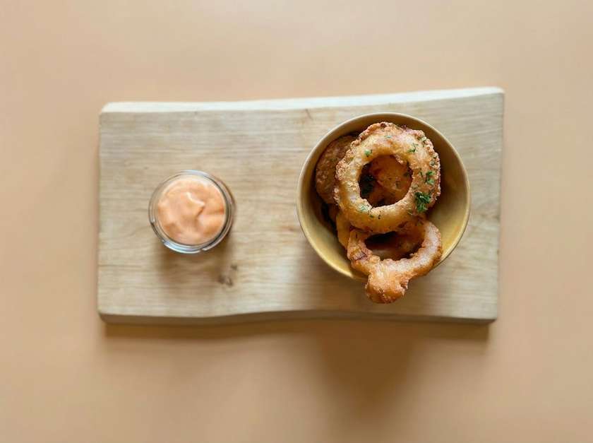 Beer-battered onion rings with dill dip