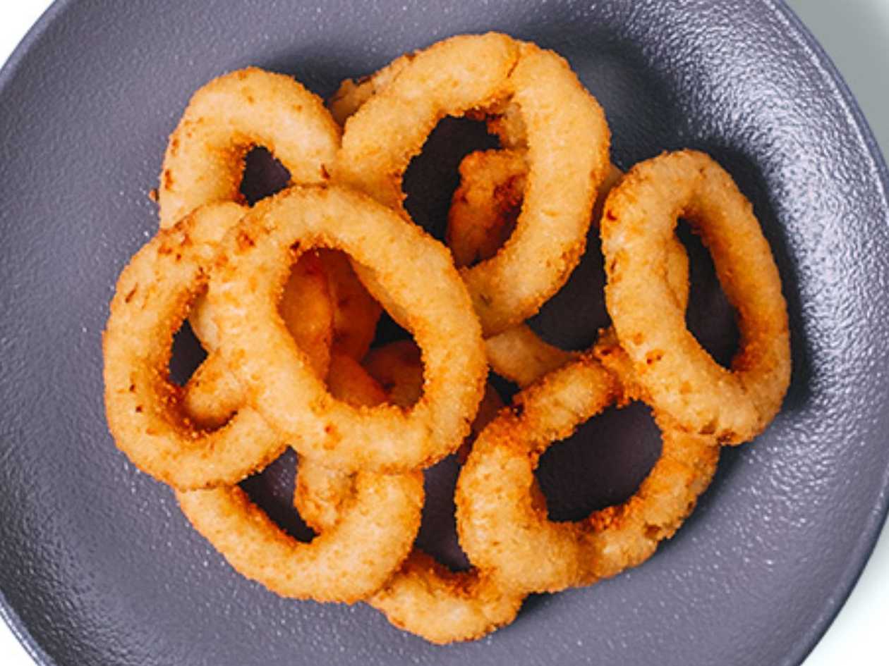 10ks. Smažené cibulové kroužky