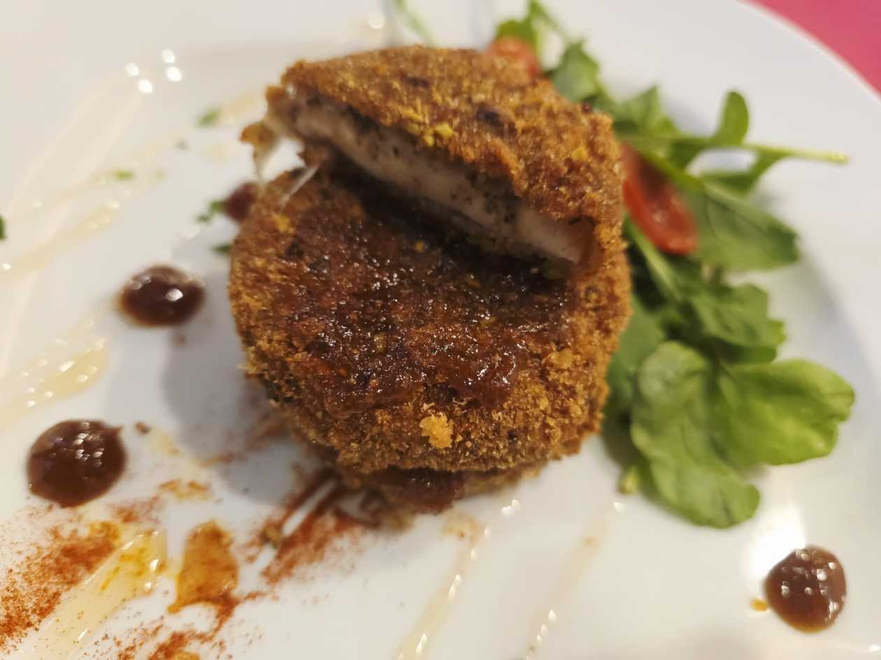 Freshly Breaded Local Gbejna Tal-Bzar (Local Peppered Cow Cheese)