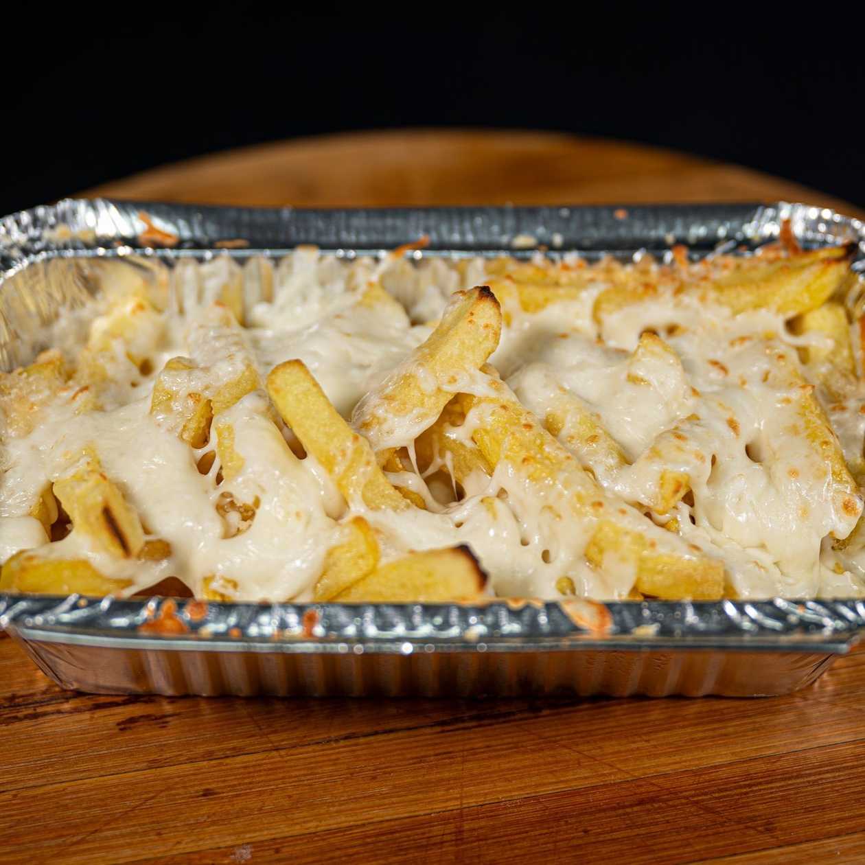 Baked Potatoes with Garlic and Mozzarella