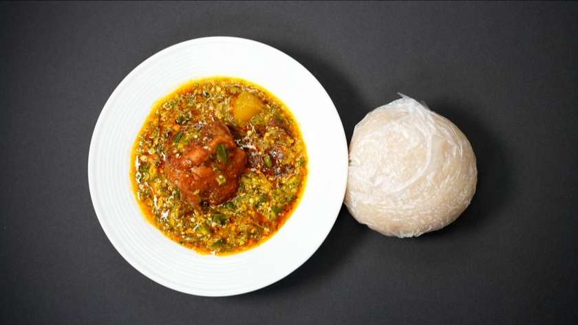 Eba with Vegetable, - or Ogbono Sauce, Eforiro, Mixed with Okro. With Fish or Turkey