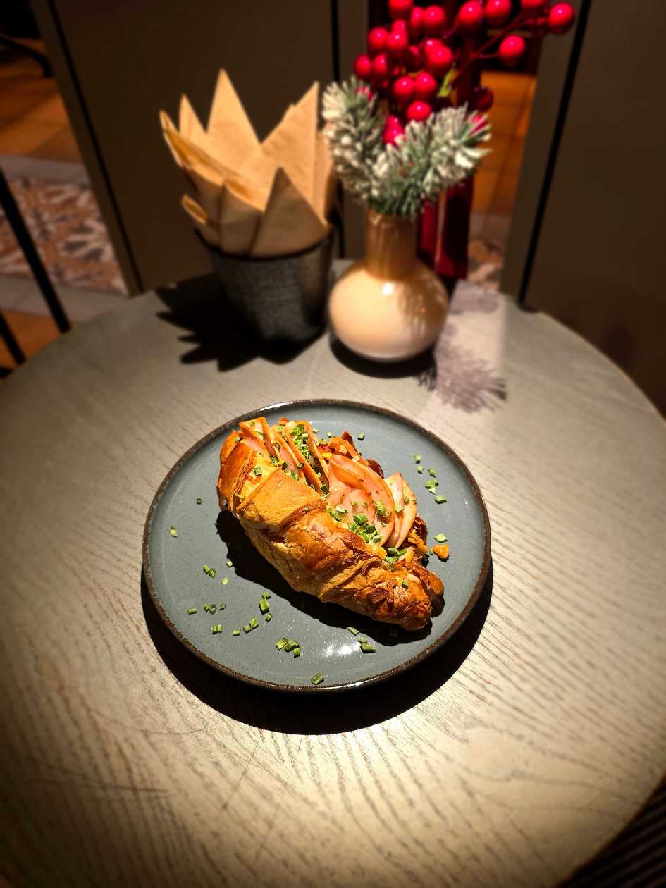 Croissant with ham and cheese