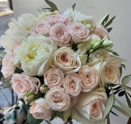 Rosas e Santa Teresinhas