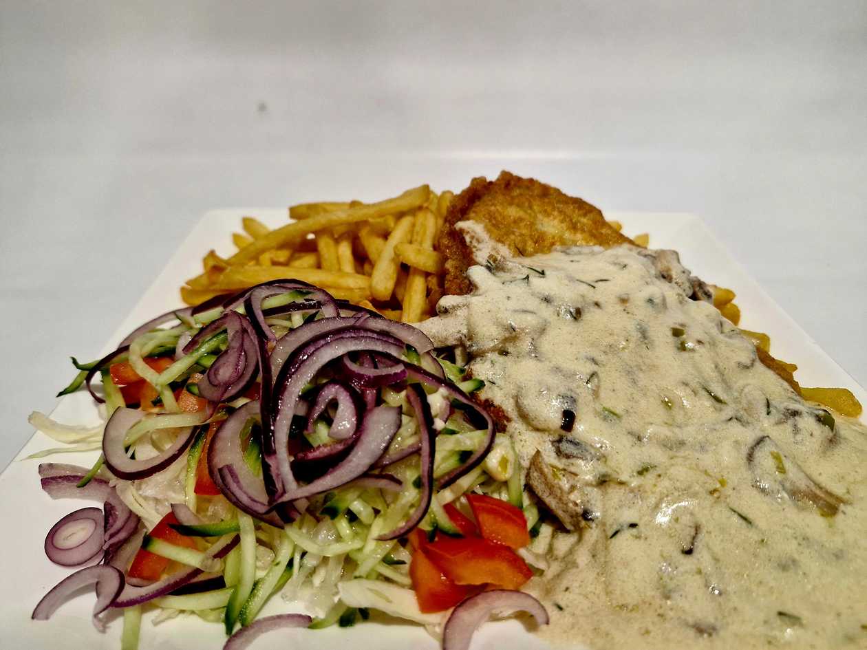 Karbonadas in mushroom sauce