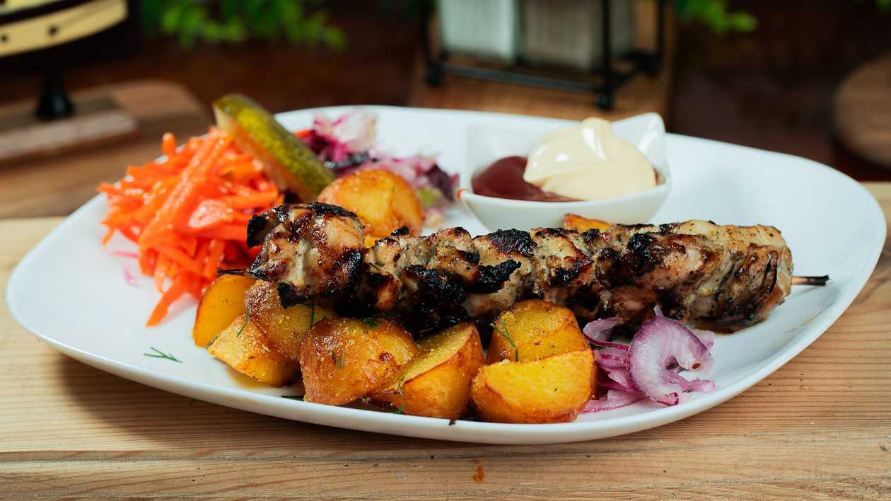 Chicken shish kebab with side dish