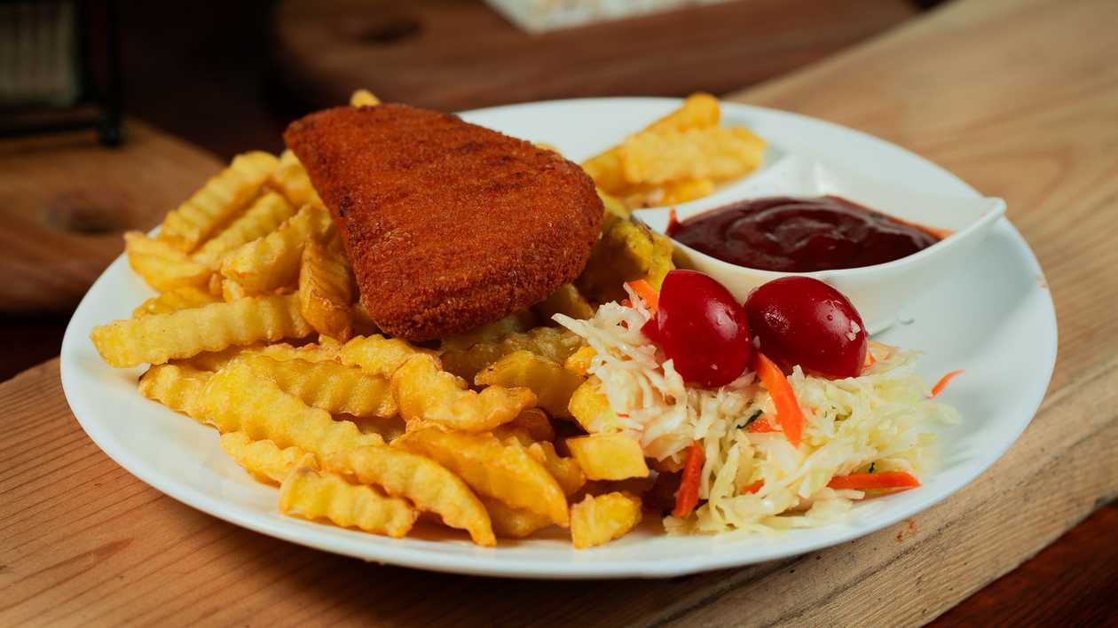 Breaded chicken stuffed with ham and cheese