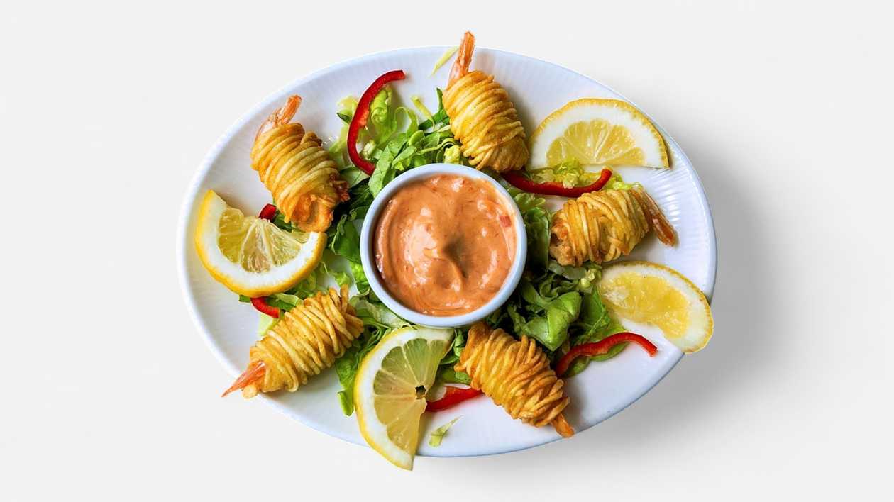 Shrimps in potato nest