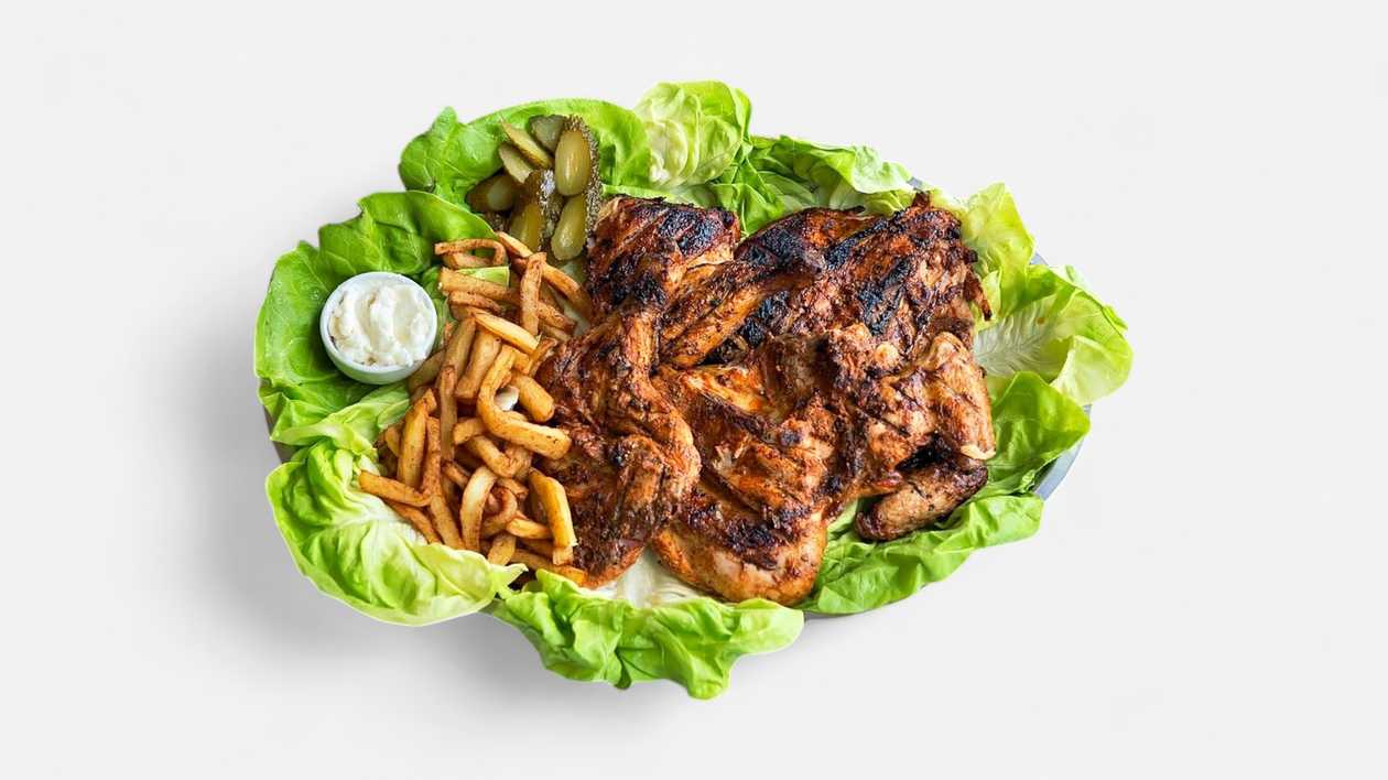 Whole chicken on grill