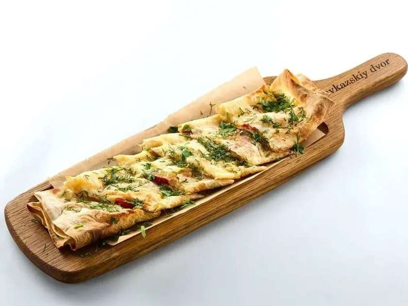 Lavash with Suluguni, Tomatoes, and Herbs on Charcoal